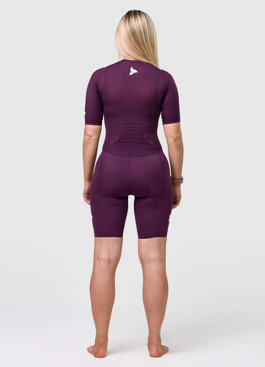Back view of TRI-FIT VANGUARD tri-suit in plum showing large aerodynamic pockets and shaped rear panel