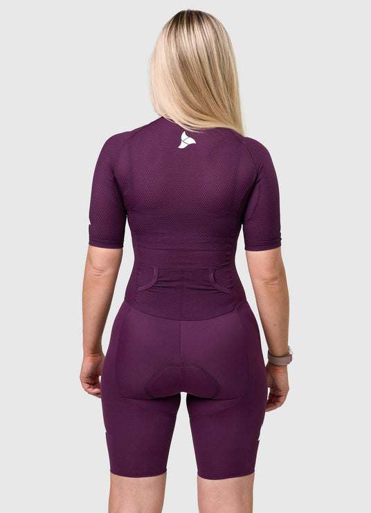 Back view of TRI-FIT VANGUARD tri-suit in plum showing large aerodynamic pockets and shaped rear panel