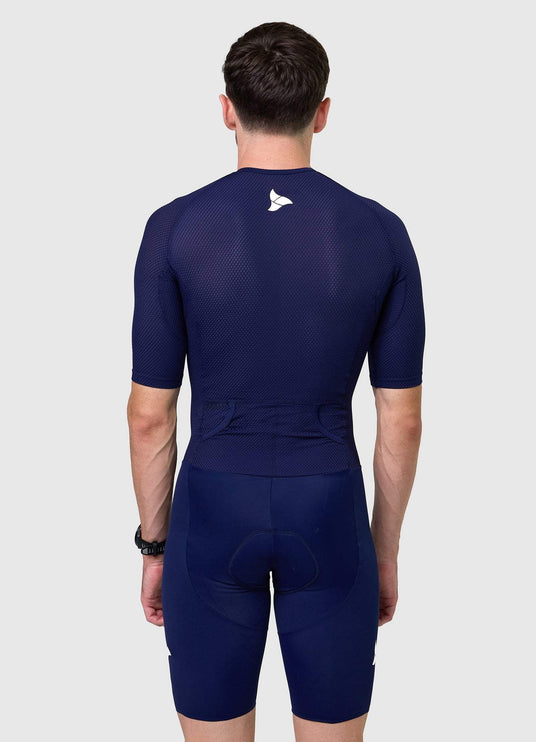 Back view of men’s VANGUARD tri-suit in navy, showing dual rear pockets and anatomical panel layout