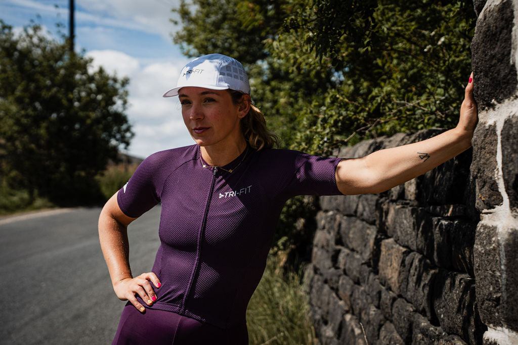 Women wearing VANGUARD PLUM tri-suit. 220 triathlon best on test. 